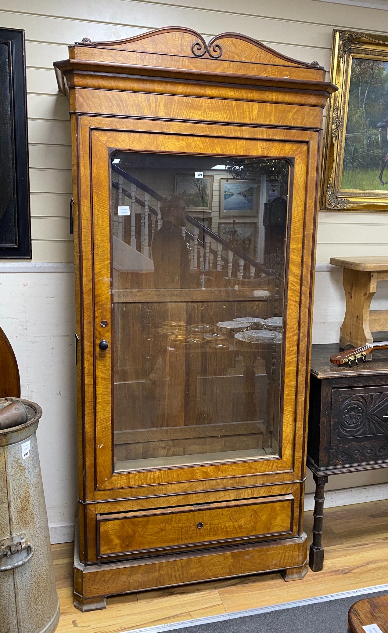 A mid 19th German satin birch vitrine, width 106cm, depth 47cm, height 221cm